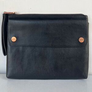 Calvin Klein black leather clutch with copper details and a modern aesthetic